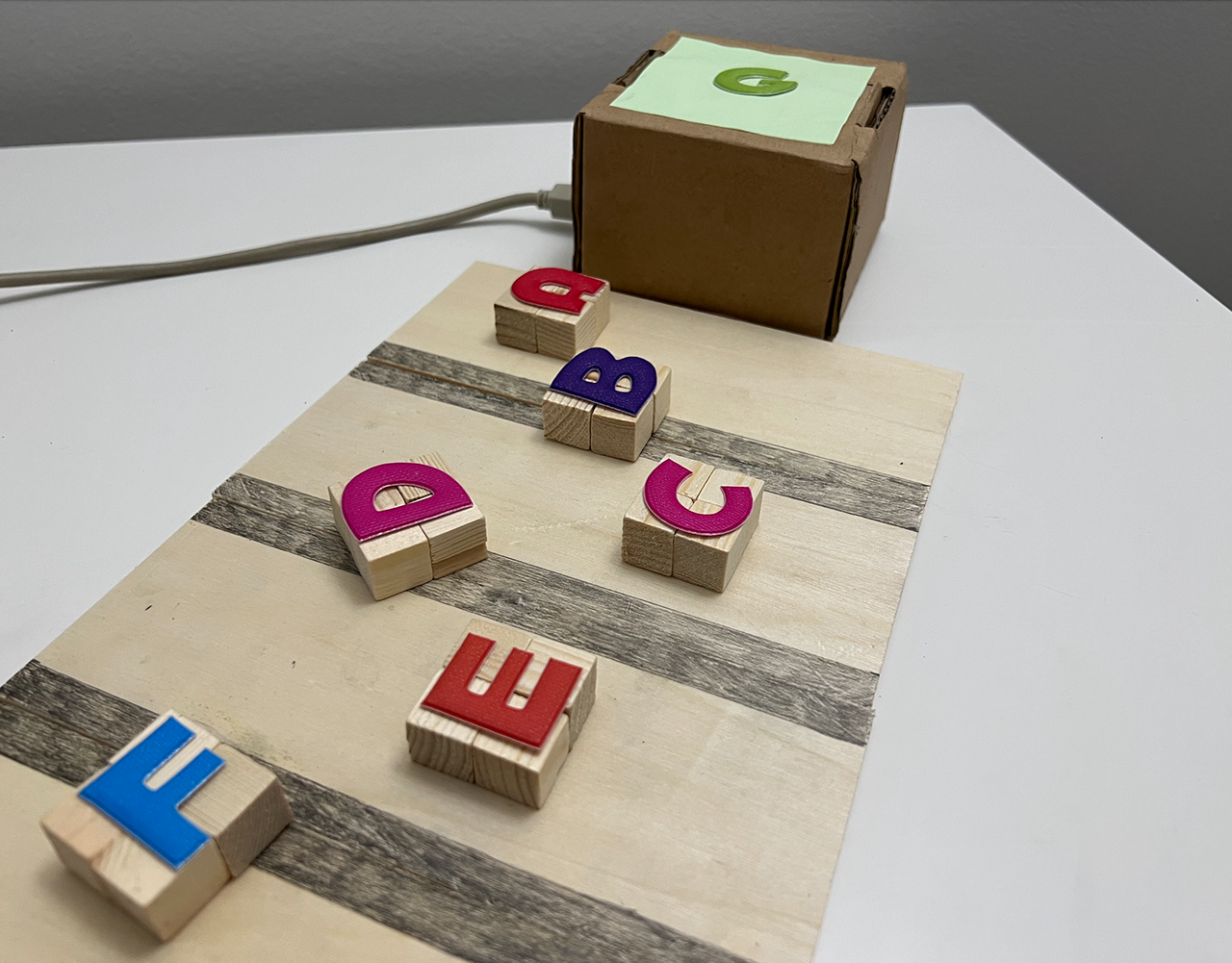 Notebox introduces children (3-6 years) to music through a interactive game where placing boxes near a Key box triggers musical notes.